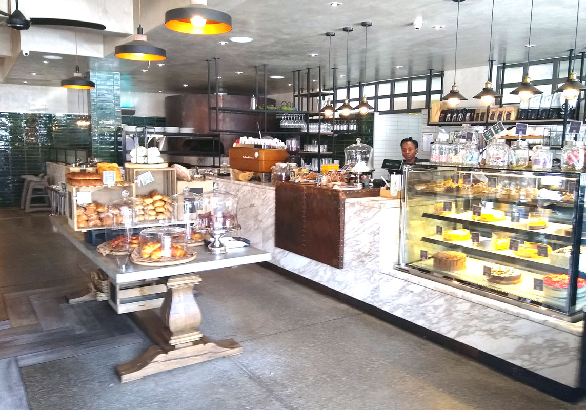 Custom restaurant bar counter fitted by Mint Interiors